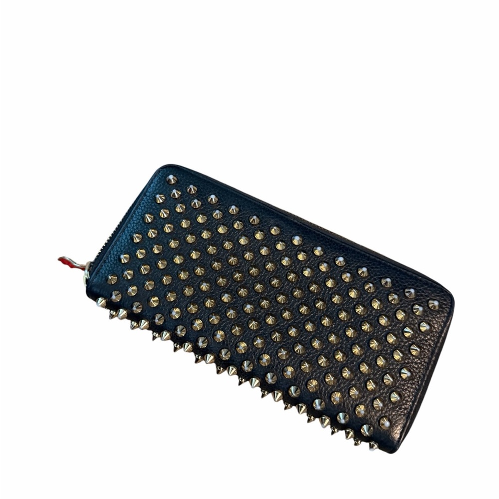 Christian Louboutin Panettone Black Studded Zip Wallet
Gold studs, red inside - Picture 1 of 7